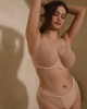 Muse Bra in Cameo Rose made for the curvy woman with a big bust lifestyle with shadow on wall