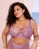Curvy woman in Brianna Strappy Plunge bra in purple heather made for the big bust and full bodied woman lifestyle