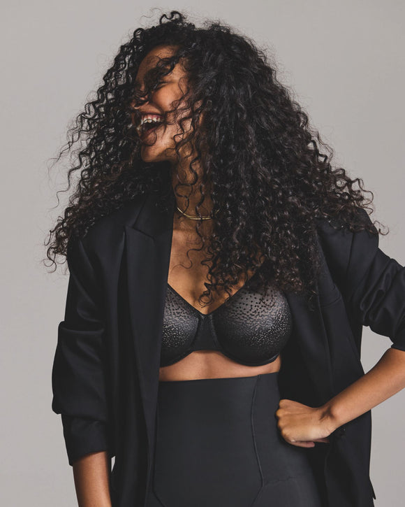 Le-Buste-Australia-WA855303-Wacoal-Back-Appeal-Full-Cup-Seamless-Bra-Black laughing with a jacket over